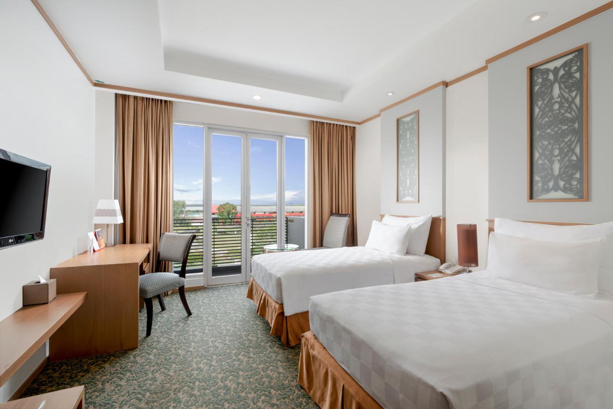 Swiss-Belhotel Danum Паланкарая Номер фото